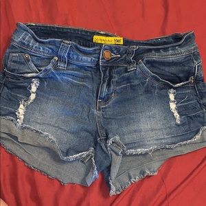 Blue jean roughed-up shorts